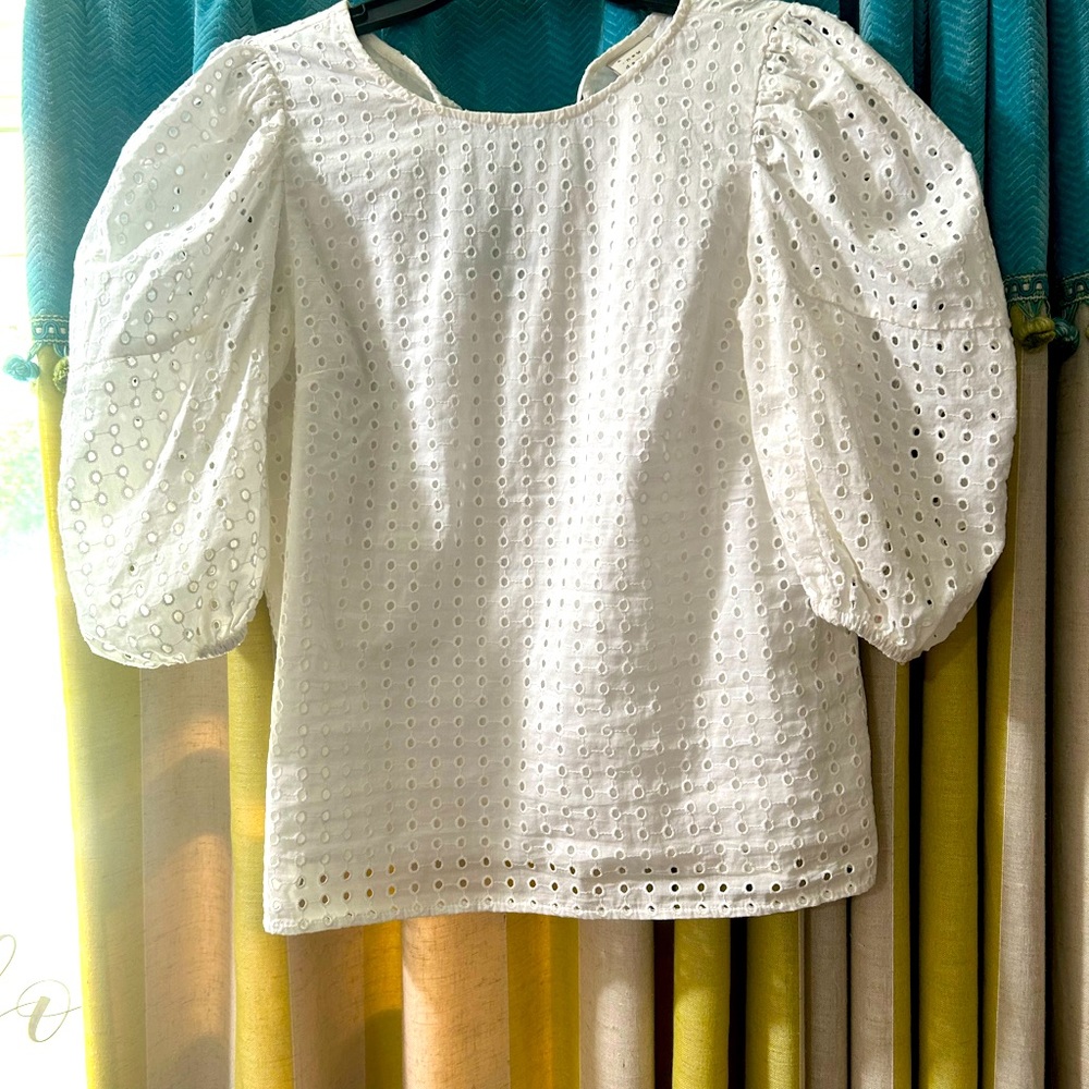 Adorable, boutique, white, size xs, but fits like a Medium